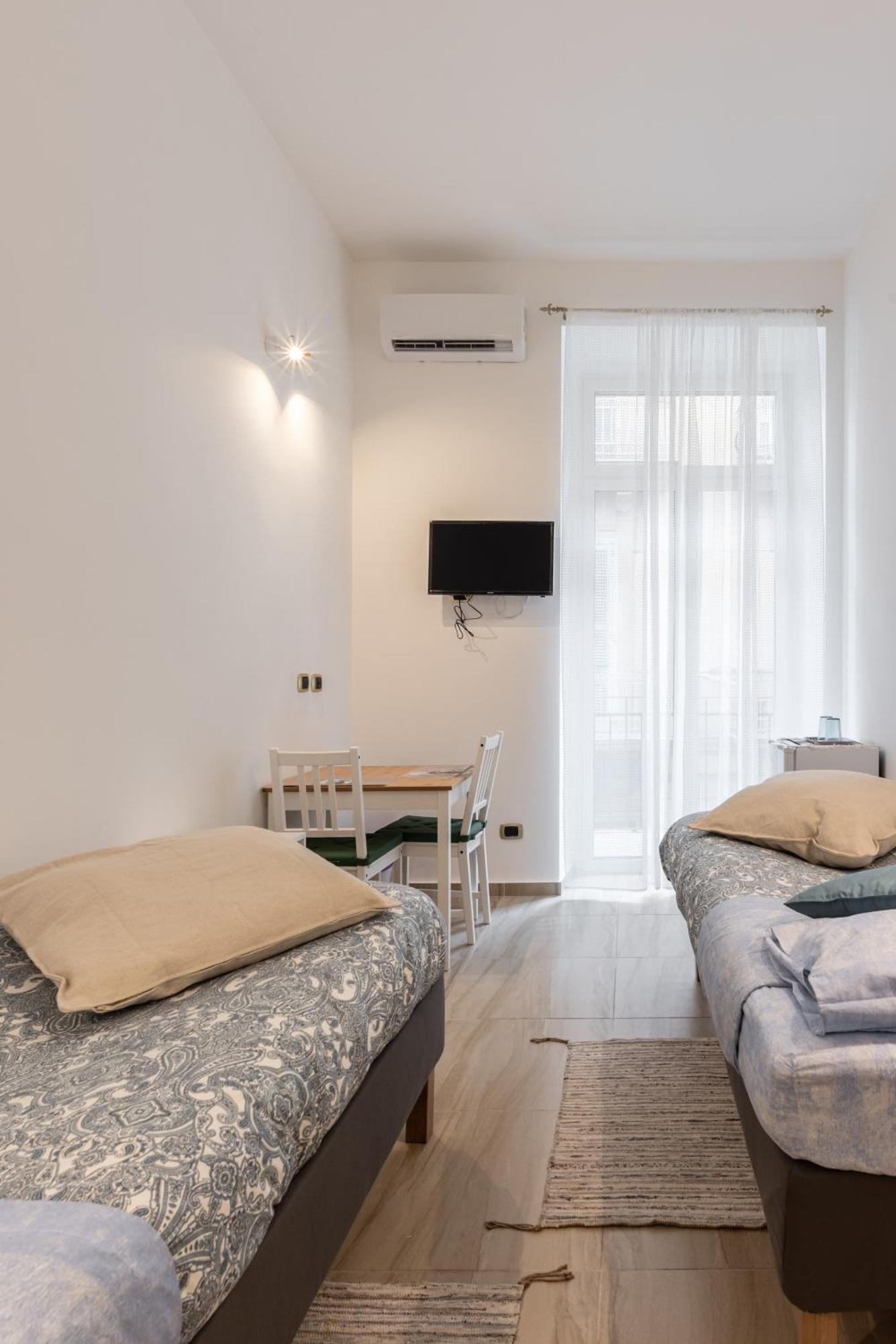 Camera Doppia con Letti Singoli con Bagno Privato Esterno
